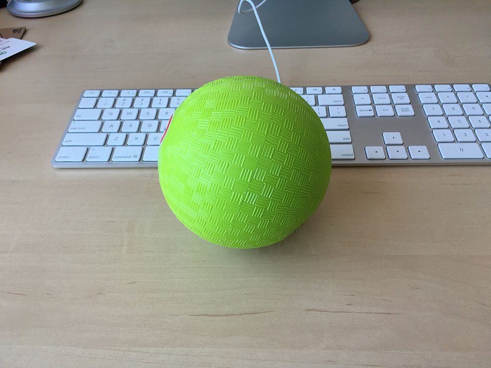 Figure 2: The green ball we will be detecting in our video stream. If the ball is found, we'll trigger an alarm by buzzing the buzzer and lighting up the green LED light.