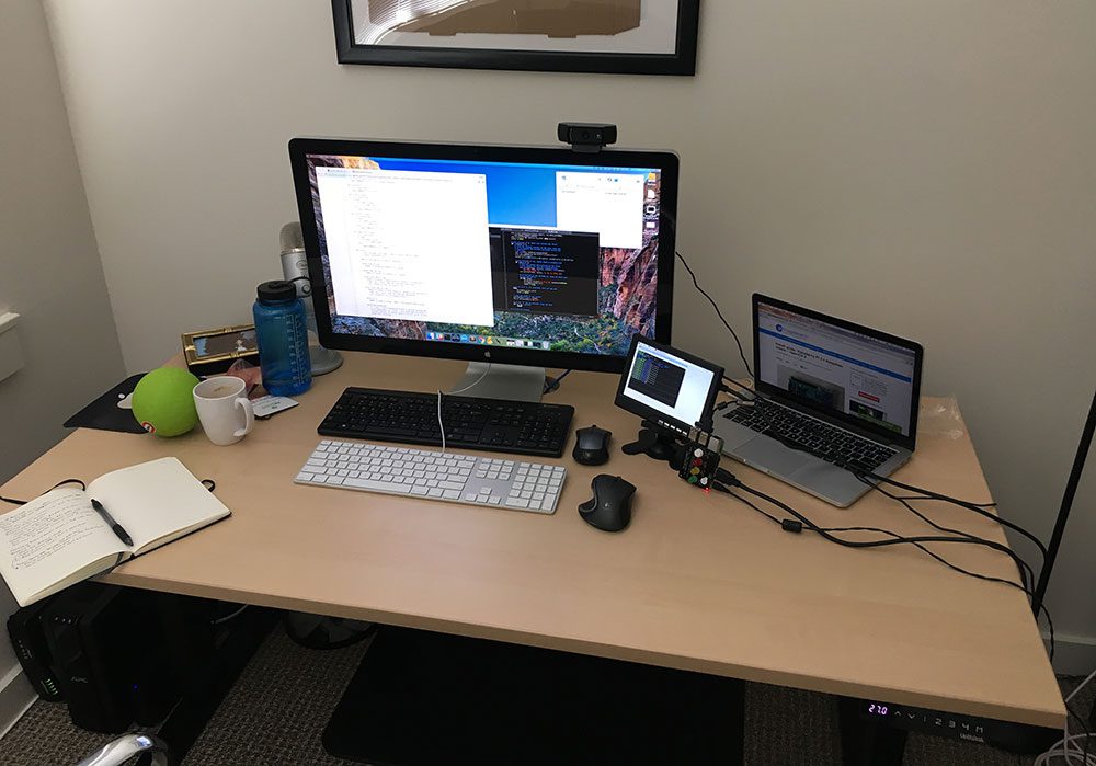 Figure 3: My example setup including the Raspberry Pi, TrafficHAT board, USB webcam, and green ball that will be detected.